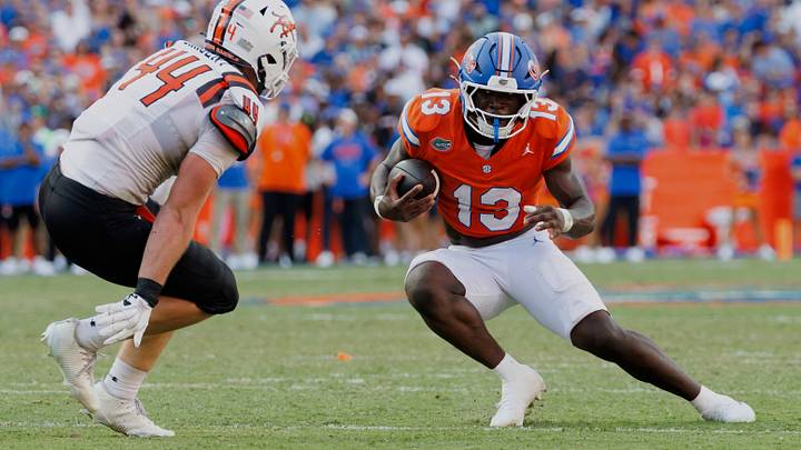 Florida running back Jadan Baugh puts a move on linebacker Landon Sargent during the Gators' 52-3 win on Saturday. Florida running back Jadan Baugh puts a move on linebacker Landon Sargent during the Gators' 52-3 win on Saturday.
