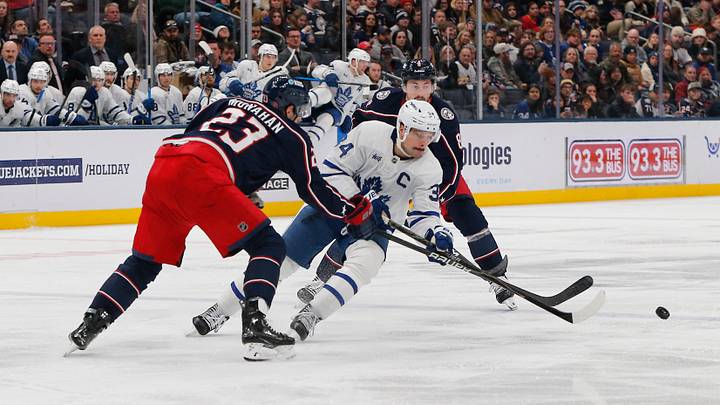 Nov 26, 2025; Columbus, Ohio, USA; Toronto Maple Leafs center Auston Matthews (34) skates away from Columbus Blue Jackets center Sean Monahan (23) during the third period at Nationwide Arena. Mandatory Credit: Russell LaBounty-Imagn Images Nov 26, 2025; Columbus, Ohio, USA; Toronto Maple Leafs center Auston Matthews (34) skates away from Columbus Blue Jackets center Sean Monahan (23) during the third period at Nationwide Arena. Mandatory Credit: Russell LaBounty-Imagn Images