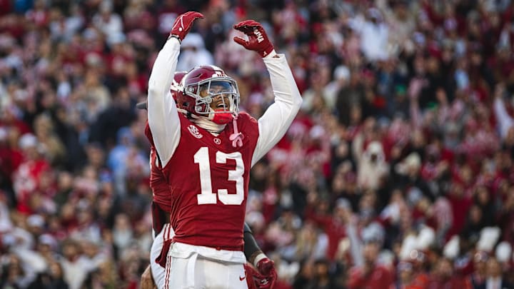 Nov 30, 2024; Tuscaloosa, Alabama, USA; Alabama Crimson Tide defensive back Malachi Moore (13) celebrates after a play against the Auburn Tigers during the second quarter at Bryant-Denny Stadium. Mandatory Credit: Will McLelland-Imagn Images