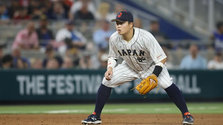Japan third baseman Munetaka Murakami (55) plays his position on March 21, 2023