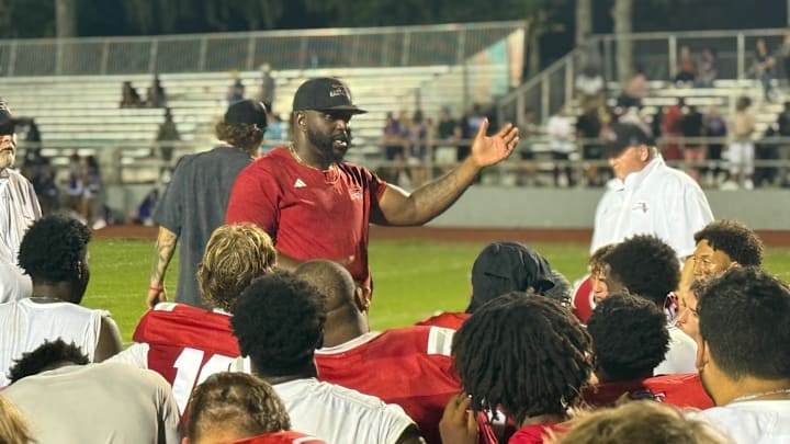Former Florida Gators running back Earnest Graham talks to his team after leading Santa Fe to a 28-14 win over Gainesville in the Raiders' preseason game. Former Florida Gators running back Earnest Graham talks to his team after leading Santa Fe to a 28-14 win over Gainesville in the Raiders' preseason game.