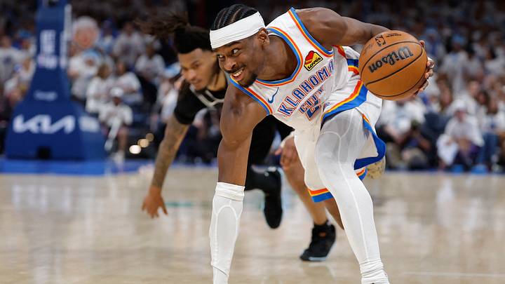 May 26, 2026; Oklahoma City, Oklahoma, USA; Oklahoma City Thunder guard Shai Gilgeous-Alexander (2) dribbles against San Antonio Spurs guard Stephon Castle (5) during the third quarter in game five of the western conference finals for the 2026 NBA playoffs at Paycom Center. Mandatory Credit: Alonzo Adams-Imagn Images