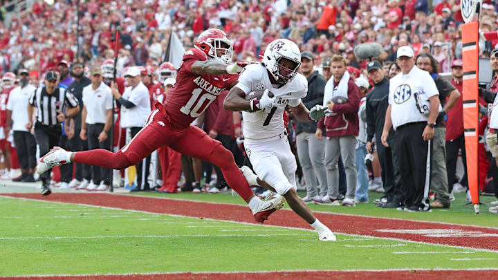 Oct 18, 2025; Fayetteville, Arkansas, USA; Texas A&M Aggies wide receiver Izaiah Williams (1) is pushed out of bounds near the goal line in the second quarter by Arkansas Razorbacks linebacker Xavian Sorey Jr (10) at Donald W. Reynolds Razorback Stadium. Oct 18, 2025; Fayetteville, Arkansas, USA; Texas A&M Aggies wide receiver Izaiah Williams (1) is pushed out of bounds near the goal line in the second quarter by Arkansas Razorbacks linebacker Xavian Sorey Jr (10) at Donald W. Reynolds Razorback Stadium.