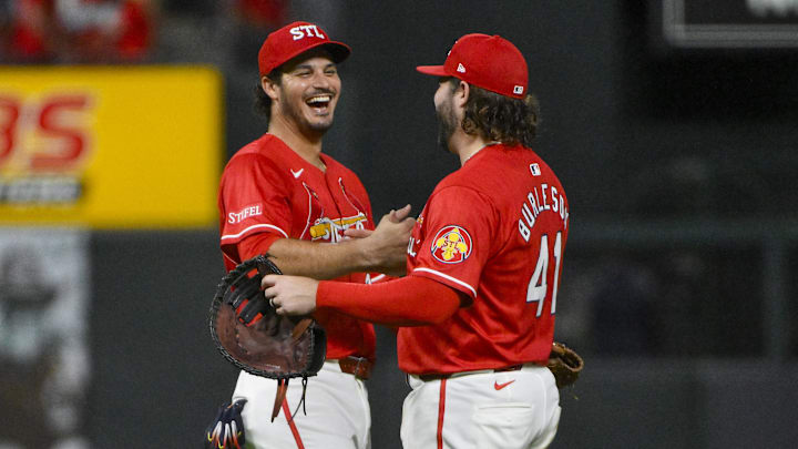 Sep 19, 2025; St. Louis, Missouri, USA;  St. Louis Cardinals third baseman Nolan Arenado (28) celebrates with first baseman Alec Burleson (41) after the Cardinals defeated the Milwaukee Brewers at Busch Stadium. Mandatory Credit: Jeff Curry-Imagn Images