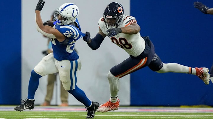 Jonathan Taylor eludes Montez Sweat and gets to the edge after cutting in Sunday's Bears loss to the Colts. Jonathan Taylor eludes Montez Sweat and gets to the edge after cutting in Sunday's Bears loss to the Colts.