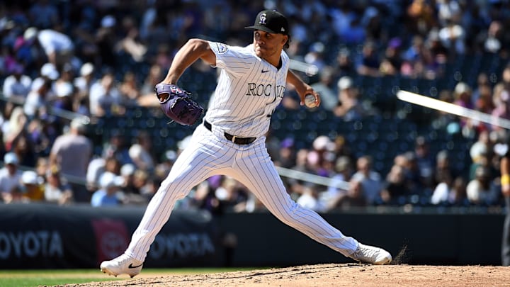 Sep 7, 2025; Denver, Colorado, USA; Colorado Rockies pitcher Luis Peralta (41) pitches during the fourth inning against the San Diego Padres at Coors Field. Mandatory Credit: Christopher Hanewinckel-Imagn Images