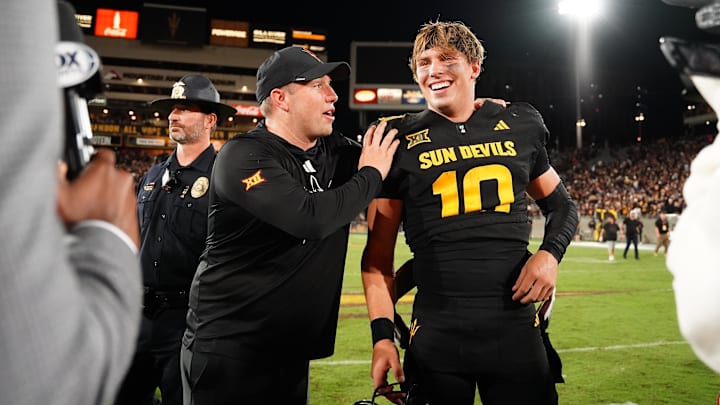 Sep 26, 2025; Tempe, Arizona, USA; Arizona State Sun Devils quarterback Sam Leavitt (10) celebrates with head coach Kenny Dillingham after win against TCU Horned Frogs at Mountain America Stadium, Home of the ASU Sun Devils. Mandatory Credit: Jacob Reiner-Imagn Images Sep 26, 2025; Tempe, Arizona, USA; Arizona State Sun Devils quarterback Sam Leavitt (10) celebrates with head coach Kenny Dillingham after win against TCU Horned Frogs at Mountain America Stadium, Home of the ASU Sun Devils. Mandatory Credit: Jacob Reiner-Imagn Images