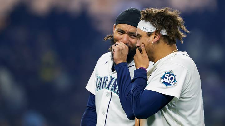 Sep 23, 2026: Seattle Mariners first baseman Josh Naylor (12) talks with shortstop J.P. Crawford (3) after hitting a walk-off RBI-single against the Houston Astros during the tenth inning at T-Mobile Park. Credit: Joe Nicholson-Imagn Images