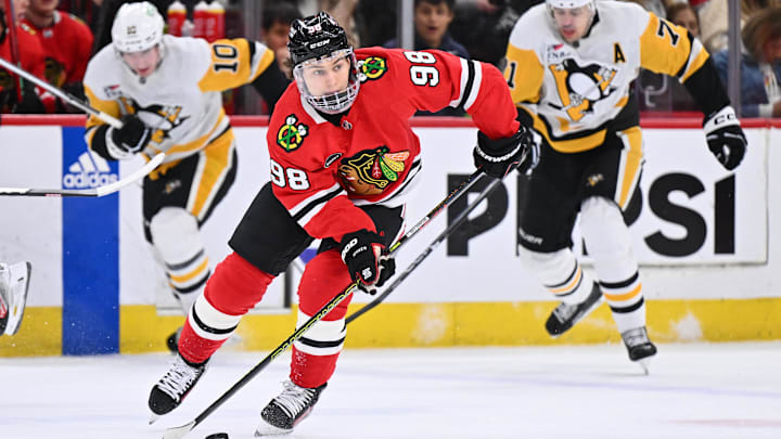 Feb 15, 2024; Chicago, Illinois, USA; Chicago Blackhawks forward Connor Bedard (98) controls the