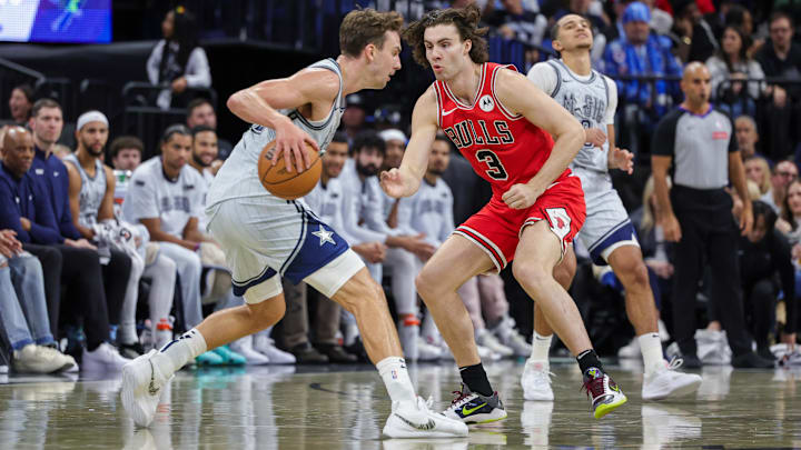 Chicago Bulls guard Josh Giddey (3) defends Orlando Magic forward Franz Wagner (22) during the second half at Kia Center.