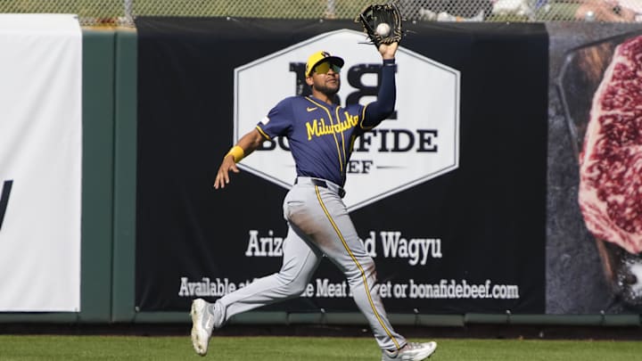 Mar 5, 2024; Scottsdale, Arizona, USA; Milwaukee Brewers right fielder Blake Perkins (16) makes the