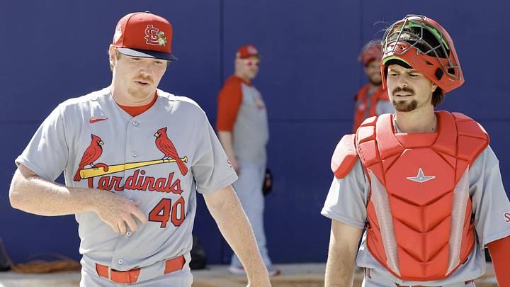 Feb 16, 2026; Jupiter, FL, USA;  St. Louis Cardinals catcher prospect Grayson Tarlow (right) walks with pitcher Hunter Dobbins (40) during spring training workouts at Roger Dean Stadium. Mandatory Credit: Reinhold Matay-Imagn Images