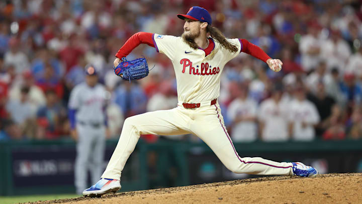 Oct 6, 2024; Philadelphia, Pennsylvania, USA; Philadelphia Phillies relief pitcher Matt Strahm (25) pitches in the ninth inning against the New York Mets  during game two of the NLDS for the 2024 MLB Playoffs at Citizens Bank Park. 