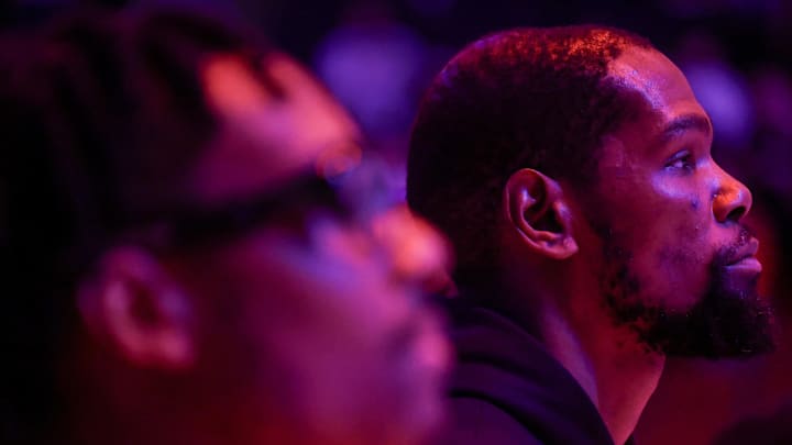 Feb 11, 2026; Houston, Texas, USA; Houston Rockets forward Kevin Durant (7) and teammates stand for the national anthem before playing against the Los Angeles Clippers at Toyota Center. Mandatory Credit: Thomas Shea-Imagn Images