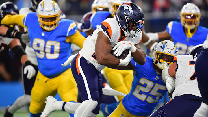 Dec 19, 2024; Inglewood, California, USA; Denver Broncos running back Audric Estime (23) runs the ball for a touchdown against the Los Angeles Chargers during the first half at SoFi Stadium. Dec 19, 2024; Inglewood, California, USA; Denver Broncos running back Audric Estime (23) runs the ball for a touchdown against the Los Angeles Chargers during the first half at SoFi Stadium.