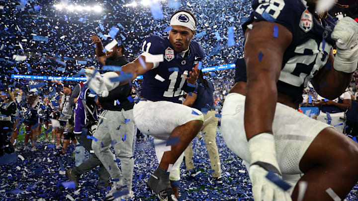 Dec 31, 2024; Glendale, AZ, USA; Penn State Nittany Lions defensive end Abdul Carter (11) reacts with teammates after defeating the Boise State Broncos in the Fiesta Bowl at State Farm Stadium. Mandatory Credit: Mark J. Rebilas-Imagn Images Dec 31, 2024; Glendale, AZ, USA; Penn State Nittany Lions defensive end Abdul Carter (11) reacts with teammates after defeating the Boise State Broncos in the Fiesta Bowl at State Farm Stadium. Mandatory Credit: Mark J. Rebilas-Imagn Images