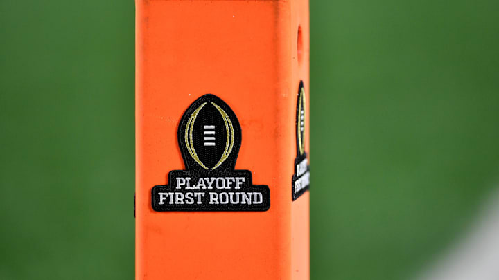 A logo for the College Football Playoff First Round on a pylon during the first quarter between the Indiana Hoosiers and Notre Dame Fighting Irish at Notre Dame Stadium. Mandatory Credit: Matt Cashore-Imagn Images