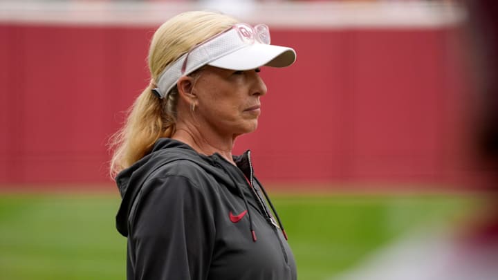 Oklahoma coach Patty Gasso watches during a softball game in the Norman Regional.