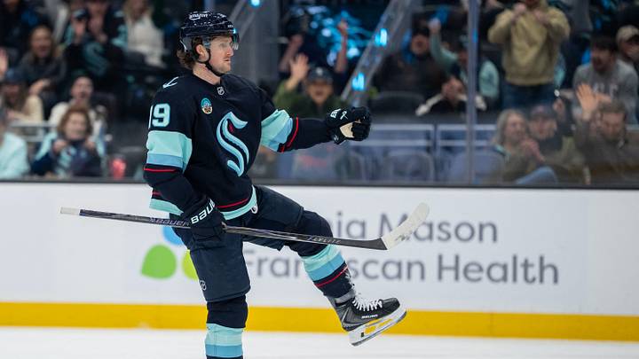 Mar 17, 2026; Seattle, Washington, USA; Seattle Kraken forward Jared McCann (19) clebrates after scoring as goal during the second period against the Tampa Bay Lightning at Climate Pledge Arena. Mandatory Credit: Stephen Brashear-Imagn Images