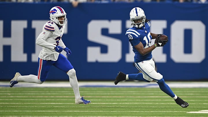 Nov 10, 2024; Indianapolis, Indiana, USA;Indianapolis Colts wide receiver Adonai Mitchell (10) runs past Buffalo Bills cornerback Rasul Douglas (31) during the second quarter at Lucas Oil Stadium. Mandatory Credit: Marc Lebryk-Imagn Images