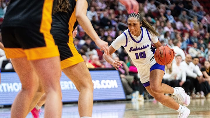 Johnston's Jenica Lewis (10) drives to the basket against Ankeny on March 5, 2026, at Casey’s Center in Des Moines.