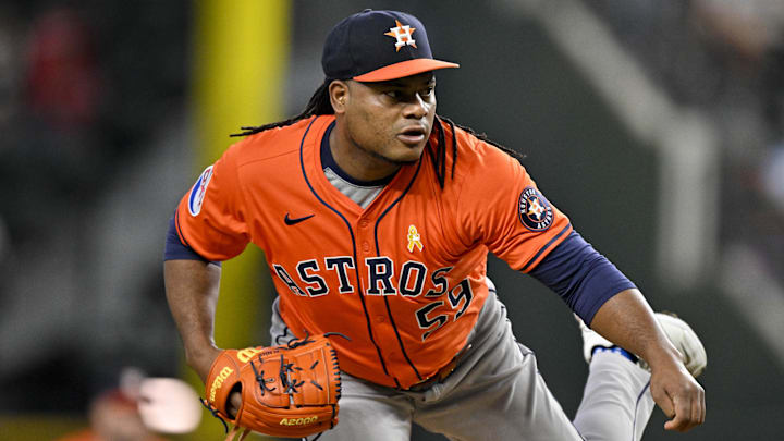 Sep 7, 2025; Arlington, Texas, USA; Houston Astros starting pitcher Framber Valdez (59) pitches against the Texas Rangers during the first inning at Globe Life Field.