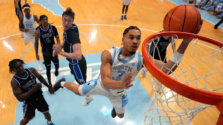 Mar 8, 2025; Chapel Hill, North Carolina, USA; North Carolina Tar Heels guard Seth Trimble (7) shoots in the second half at Dean E. Smith Center. Mandatory Credit: Bob Donnan-Imagn Images