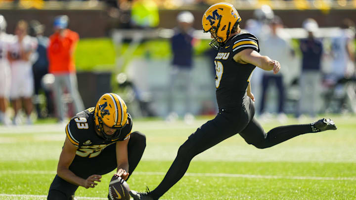 Oct 19, 2024; Columbia, Missouri, USA; Missouri Tigers place kicker Blake Craig (19) kicks a field goal during the second half against the Auburn Tigers at Faurot Field at Memorial Stadium. Mandatory Credit: Jay Biggerstaff-Imagn Images