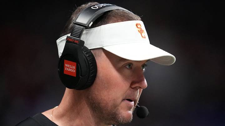 Dec 30, 2025; San Antonio, TX, USA; Southern California Trojans head coach Lincoln Riley watches in the first half against the TCU Horned Frogs during the Alamo Bowl at Alamodome. Mandatory Credit: Kirby Lee-Imagn Images