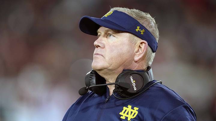 Nov 27, 2021; Stanford, California, USA; Notre Dame Fighting Irish head coach Brian Kelly walks on the field during the second quarter against the Stanford Cardinal at Stanford Stadium. Nov 27, 2021; Stanford, California, USA; Notre Dame Fighting Irish head coach Brian Kelly walks on the field during the second quarter against the Stanford Cardinal at Stanford Stadium.