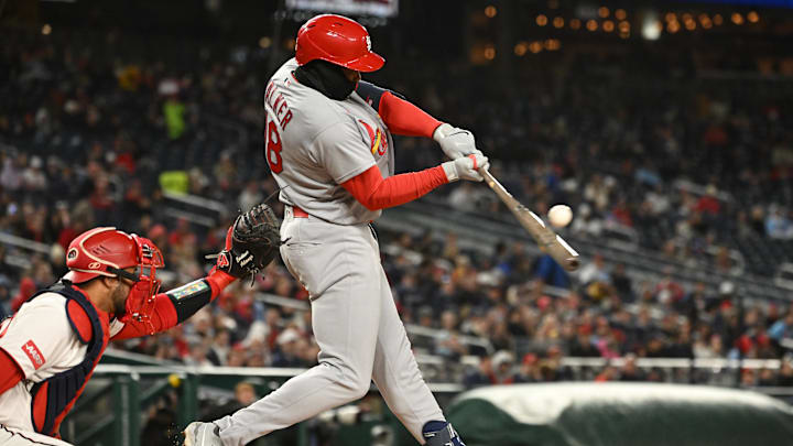Apr 7, 2026; Washington, District of Columbia, USA; St. Louis Cardinals right fielder Jordan Walker (18) hits the ball into play against the Washington Nationals during the fifth inning at Nationals Park. Mandatory Credit: Rafael Suanes-Imagn Images
