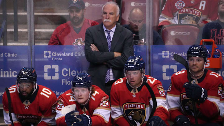 Oct 27, 2021; Sunrise, Florida, USA; Florida Panthers head coach Joel Quenneville watches during the first period against the Boston Bruins at FLA Live Arena. Mandatory Credit: Jasen Vinlove-Imagn Images