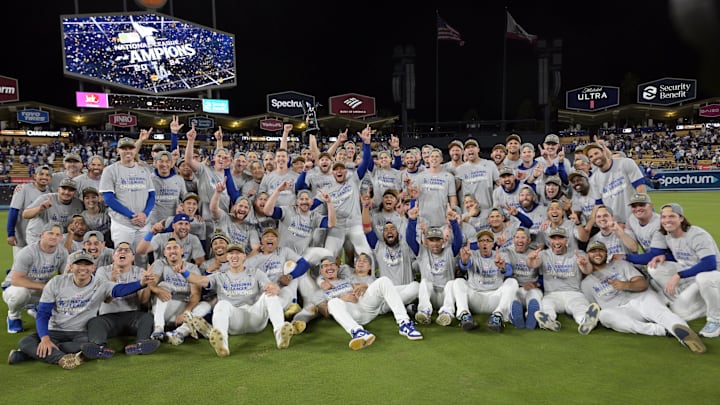 Oct 20, 2024; Los Angeles, California, USA; The Los Angeles Dodgers celebrate on the field after defeating the New York Mets in game six of the NLCS for the 2024 MLB playoffs to advance to the World Series at Dodger Stadium. Mandatory Credit: Jayne Kamin-Oncea-Imagn Images
