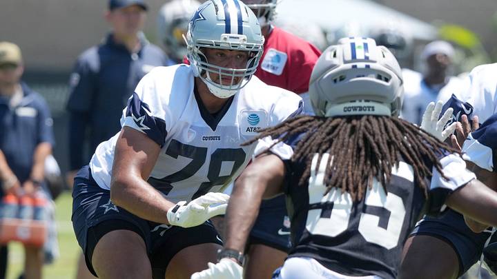 Dallas Cowboys offensive tackle Terence Steele defends against linebacker Jaishawn Barham at training camp. Dallas Cowboys offensive tackle Terence Steele defends against linebacker Jaishawn Barham at training camp.