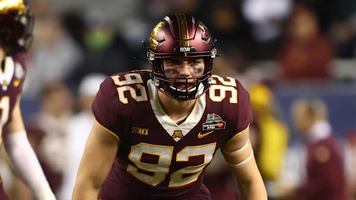 Dec 28, 2021; Phoenix, AZ, USA; Minnesota Golden Gophers defensive lineman Danny Striggow (92) against the West Virginia Mountaineers in the Guaranteed Rate Bowl at Chase Field. Mandatory Credit: Mark J. Rebilas-Imagn Images