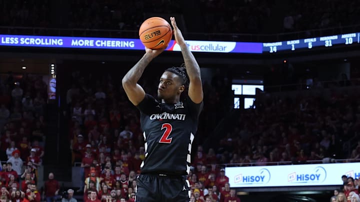 Feb 15, 2025; Ames, Iowa, USA; Cincinnati Bearcats guard Jizzle James (2) shoots against the Iowa State Cyclones during the second half at James H. Hilton Coliseum. Mandatory Credit: Reese Strickland-Imagn Images Feb 15, 2025; Ames, Iowa, USA; Cincinnati Bearcats guard Jizzle James (2) shoots against the Iowa State Cyclones during the second half at James H. Hilton Coliseum. Mandatory Credit: Reese Strickland-Imagn Images