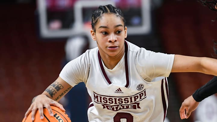 Mississippi State guard Jerkaila Jordan (2) moves the ball past Texas A & M guard Tineya Hylton (3) during the third quarter of the SEC Women's Basketball Tournament game three at the Bon Secours Wellness Arena in Greenville, S.C. Thursday, March 7, 2024.
