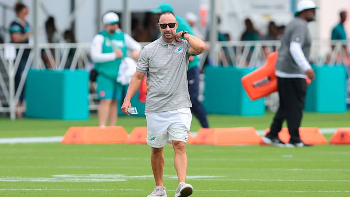 Miami Dolphins general manager Jon-Eric Sullivan walks on the field during practice at Baptist Health Training Complex. Miami Dolphins general manager Jon-Eric Sullivan walks on the field during practice at Baptist Health Training Complex.