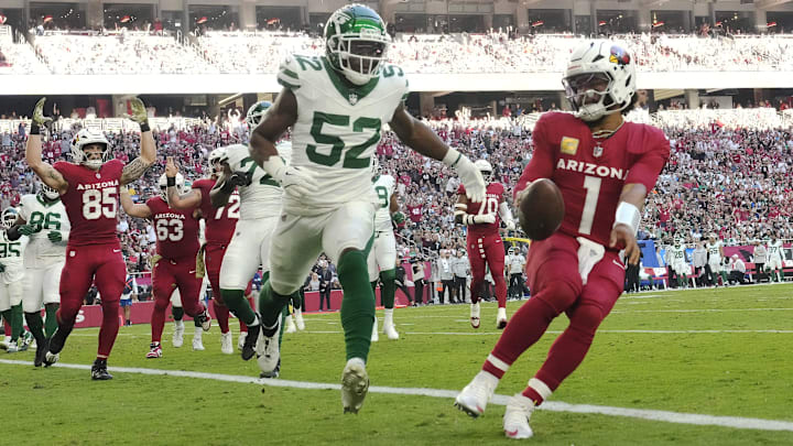 Arizona Cardinals quarterback Kyler Murray (1) scores a touchdown ahead of New York Jets linebacker Sam Eguavoen (52) during the first quarter at State Farm Stadium on Nov 10, 2024, in Glendale.