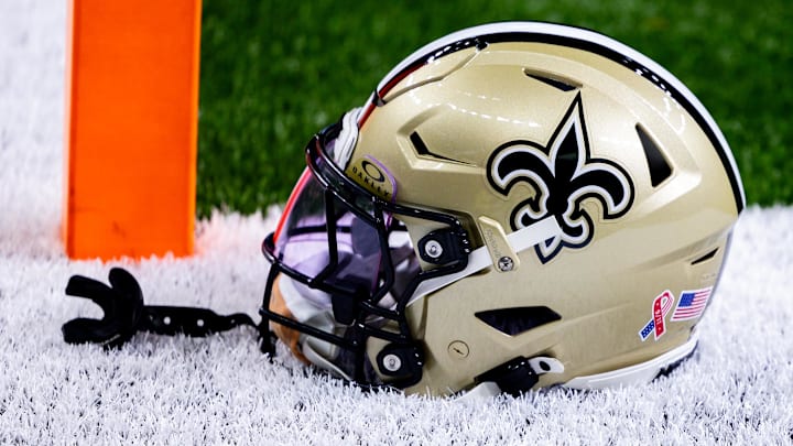 Sep 8, 2024; New Orleans, Louisiana, USA;  Detailed view of the New Orleans Saints football helmet before the game against the Carolina Panthers during the pregame at Caesars Superdome. Mandatory Credit: Stephen Lew-Imagn Images