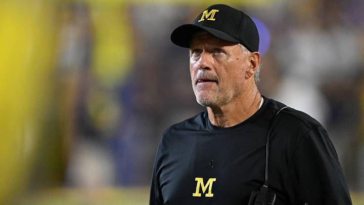 Sep 5, 2026; Ann Arbor, Michigan, USA;  Michigan head coach Kyle Whittingham looks at the scoreboard during a break in the action against Western Michigan in the second quarter at Michigan Stadium.  Mandatory Credit: Lon Horwedel-Imagn Images