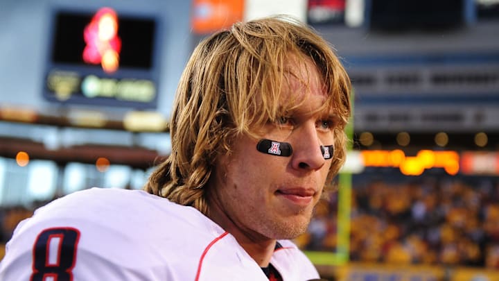 Nov. 28, 2009; Tempe, AZ, USA; Arizona Wildcats quarterback (8) Nick Foles following the game against the Arizona State Sun Devils at Sun Devil Stadium. Arizona defeated Arizona State 20-17. Mandatory Credit: Mark J. Rebilas-Imagn Images Nov. 28, 2009; Tempe, AZ, USA; Arizona Wildcats quarterback (8) Nick Foles following the game against the Arizona State Sun Devils at Sun Devil Stadium. Arizona defeated Arizona State 20-17. Mandatory Credit: Mark J. Rebilas-Imagn Images