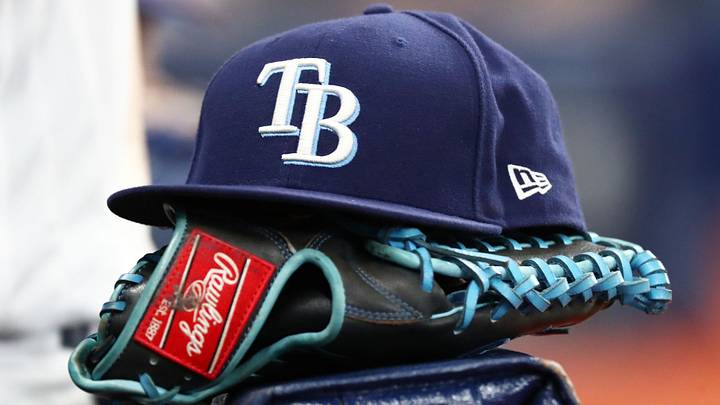 Sep 6, 2019; St. Petersburg, FL, USA; A detail view of a Tampa Bay Rays hat and glove at Tropicana Field.