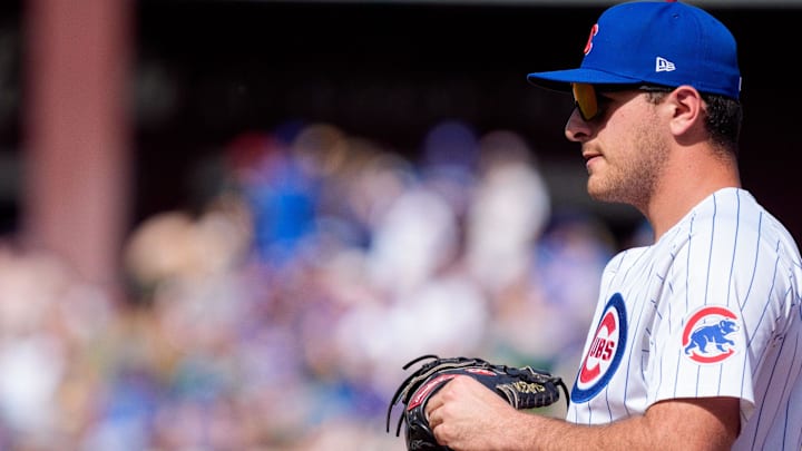 Feb 25, 2024; Mesa, Arizona, USA; Chicago Cubs infielder Matt Mervis (22) reacts between plays in