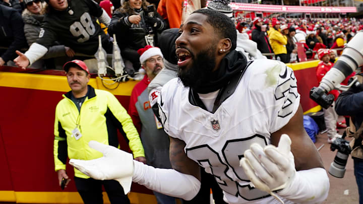 Dec 25, 2023; Kansas City, Missouri, USA; Las Vegas Raiders cornerback Nate Hobbs (39) interacts with the crowd after defeating the Kansas City Chiefs at GEHA Field at Arrowhead Stadium. Mandatory Credit: Jay Biggerstaff-USA TODAY Sports