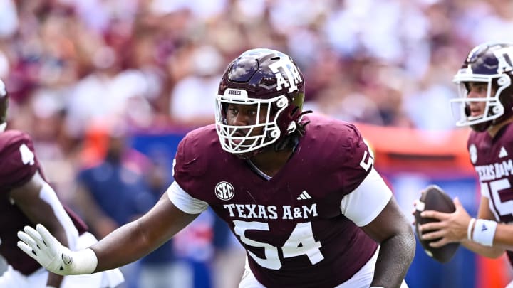 Sep 23, 2023; College Station, Texas, USA; Texas A&M Aggies offensive lineman Mark Nabou Jr. (54) in action during the first half against the Auburn Tigers at Kyle Field. Mandatory Credit: Maria Lysaker-USA TODAY Sports