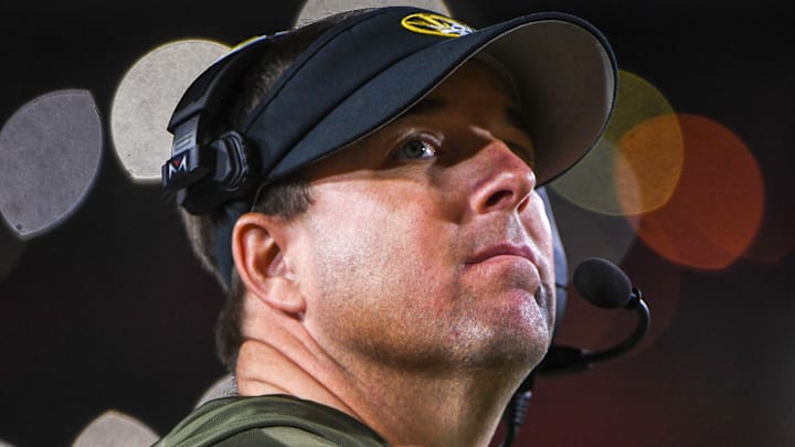 Nov 15, 2025; Columbia, Missouri, USA; Missouri Tigers head coach Eli Drinkwitz looks at the scoreboard in the Missouri matchup against Mississippi State at Faurot Field.