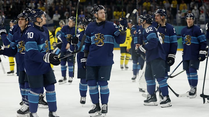 Feb 13, 2026; Milan, Italy; Henri Jokiharju and Nikolas Matinpalo of Finland celebrate after the match against Finland in men's ice hockey group B play during the Milano Cortina 2026 Olympic Winter Games at Milano Santagiulia Ice Hockey Arena. Mandatory Credit: Geoff Burke-Imagn Images Feb 13, 2026; Milan, Italy; Henri Jokiharju and Nikolas Matinpalo of Finland celebrate after the match against Finland in men's ice hockey group B play during the Milano Cortina 2026 Olympic Winter Games at Milano Santagiulia Ice Hockey Arena. Mandatory Credit: Geoff Burke-Imagn Images
