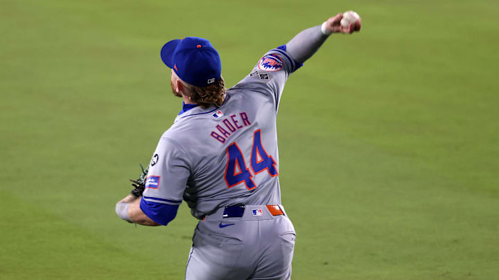 Oct 13, 2024; Los Angeles, California, USA; New York Mets outfielder Harrison Bader (44) makes a throw to home plate against the Los Angeles Dodgers in the eighth inning during game one of the NLCS for the 2024 MLB Playoffs at Dodger Stadium. Oct 13, 2024; Los Angeles, California, USA; New York Mets outfielder Harrison Bader (44) makes a throw to home plate against the Los Angeles Dodgers in the eighth inning during game one of the NLCS for the 2024 MLB Playoffs at Dodger Stadium.