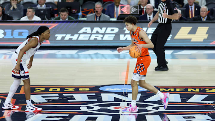 Apr 4, 2026; Indianapolis, IN, USA; Illinois Fighting Illini Keaton Wagler (23) dribbles the ball against UConn Huskies Silas Demary Jr. (2) during the Final Four of the 2026 NCAA Tournament. Apr 4, 2026; Indianapolis, IN, USA; Illinois Fighting Illini Keaton Wagler (23) dribbles the ball against UConn Huskies Silas Demary Jr. (2) during the Final Four of the 2026 NCAA Tournament.